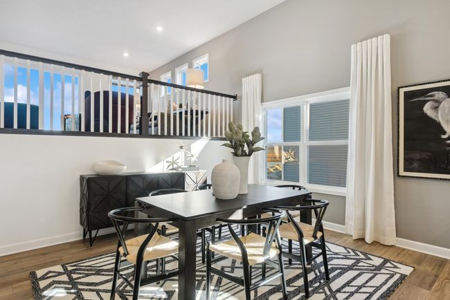 *Photo of model home, actual features may vary. Soaked in natural sunlight, the homes eat-in dining room has ample room for a dining table located in the heart of the home. | Image 6