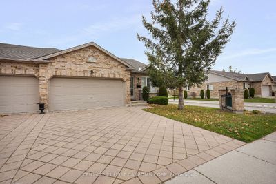 568 Thistlewood Dr, Condo with 2 bedrooms, 3 bathrooms and 4 parking in London ON | Image 3