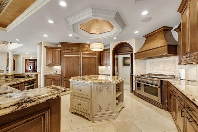 view of kitchen with built in double refrigerator | Image 18