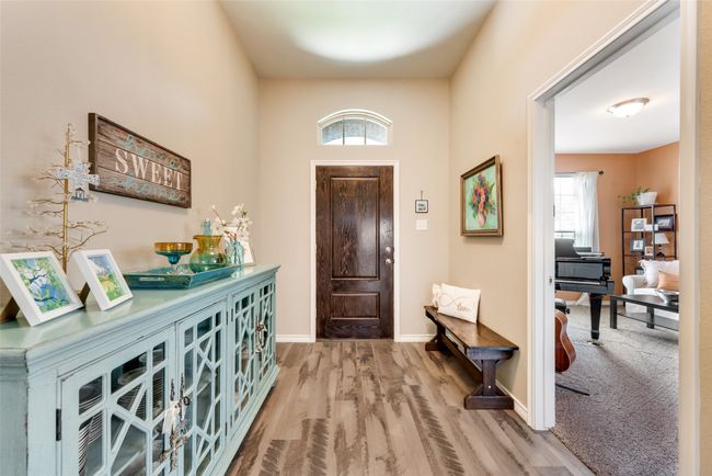 Foyer featuring plenty of natural light and wood finished floors | Image 4