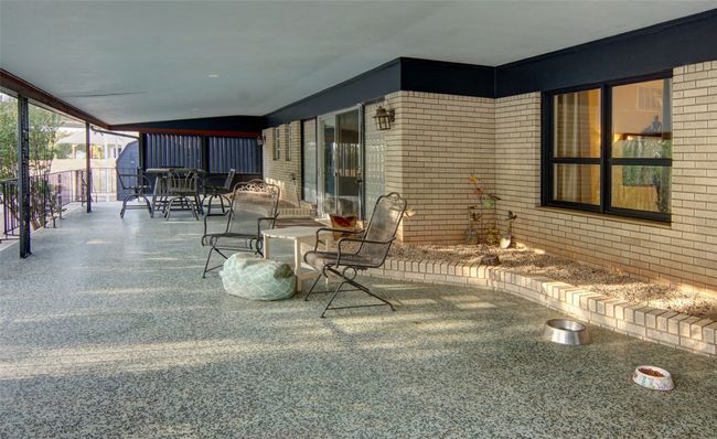 This huge covered patio is easily accessed from the kitchen or living room ... | Image 27