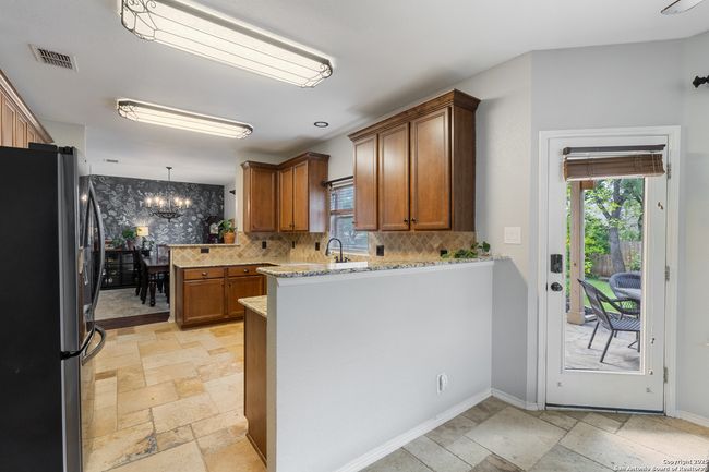 8902 Burnt Path, House other with 3 bedrooms, 3 bathrooms and null parking in Helotes TX | Image 11