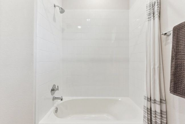 Fresh & Functional: Each bathroom features tasteful updates and modern finishes. | Image 18