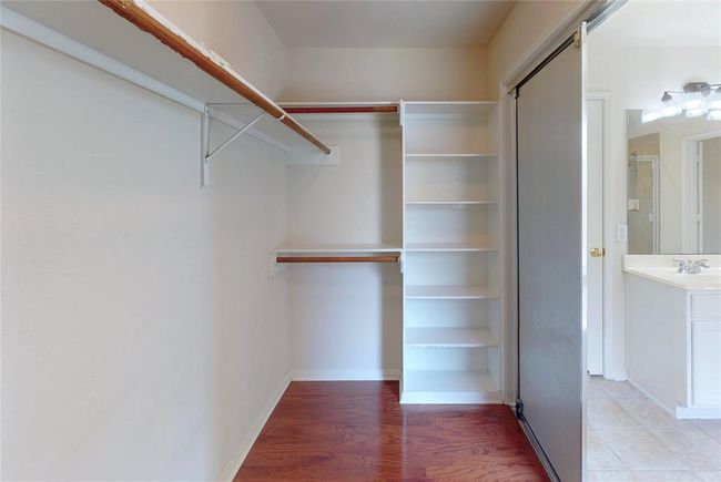 Good size primary closet | Image 32