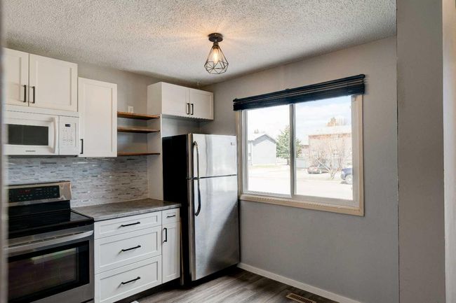 7812 Cedarwood Park, Home with 3 bedrooms, 1 bathrooms and 2 parking in Grande Prairie AB | Image 4