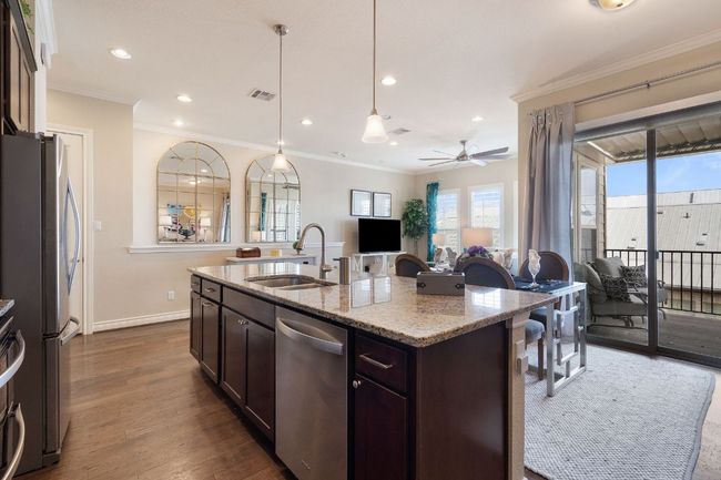2nd Floor Kitchen with appliances with stainless steel finishes, open floor plan, and a sink | Image 14