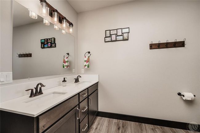 Dual sink vanity in the primary bathroom. | Image 18