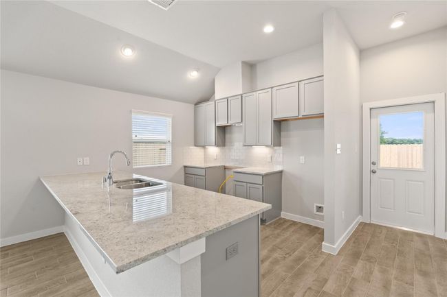 This photo is for illustrative purposes only and is not to be considered an exact replica of the finished home. Rendering does not match the finished product in terms of features, colors, landscaping, etc. Pricing, specifications, square footage and materials are subject to change at any time and without notice. | Image 5