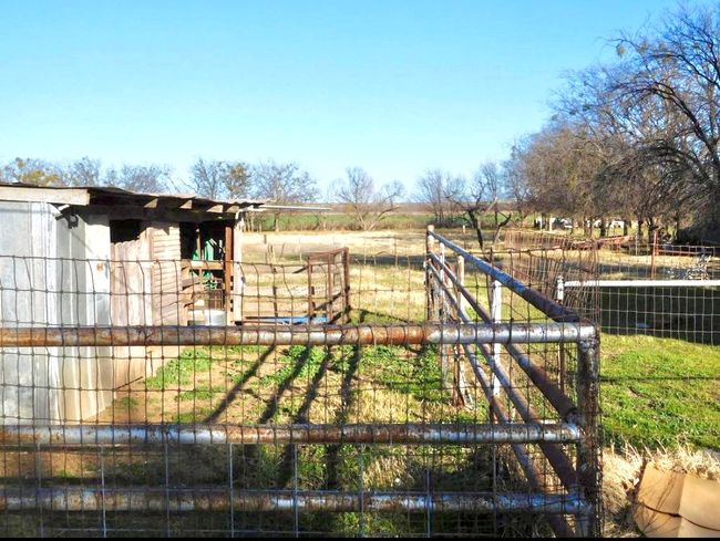 View of gate featuring a rural view | Image 13