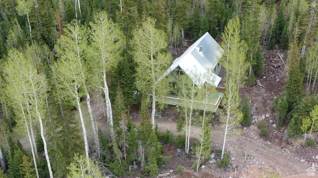 View of property location featuring a heavily wooded area | Image 66