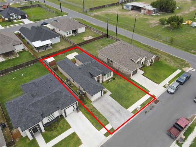 Aerial perspective of suburban area featuring property parcel outlined | Image 23