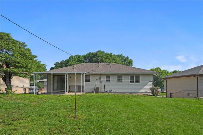 Rear view of property with a sunroom | Image 26
