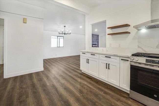 Kitchen open to dining room | Image 23