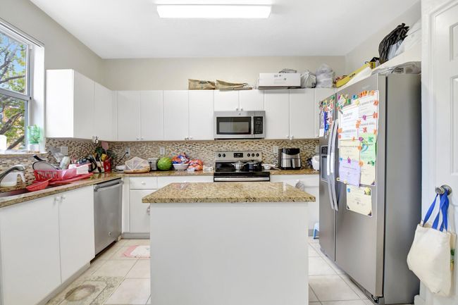 1910 Shoma Dr, Condo with 3 bedrooms, 4 bathrooms and null parking in Royal Palm Beach FL | Image 20