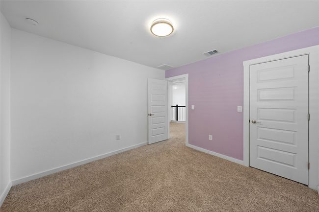 Unfurnished bedroom featuring baseboards, visible vents, and carpet | Image 29