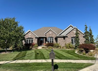 3218 154th Street, Home with 4 bedrooms, 2 bathrooms and null parking in Urbandale IA | Image 1