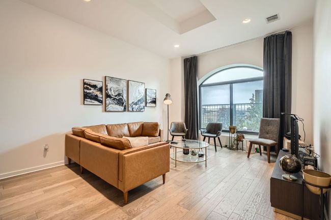 Living room with recessed lighting, light wood finished floors, and visible vents | Image 5