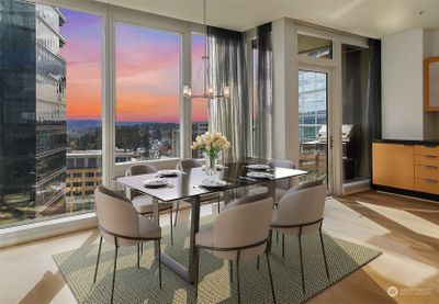 Enjoy southeastern views from the 20th floor. The dining room offers rift-cut custom oak built-ins and includes a wine refrigerator for convenience. | Image 2