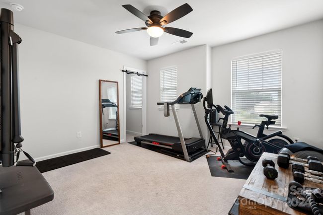 This bedroom is currently being used as a work-out room. Tonal machine does not convey! | Image 25