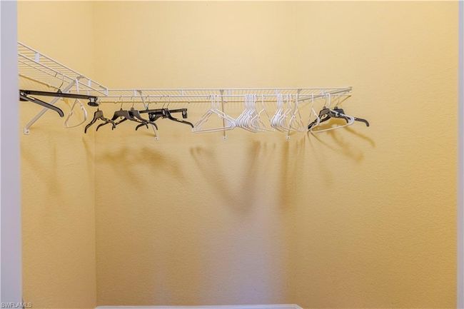 View of walk in closet | Image 19