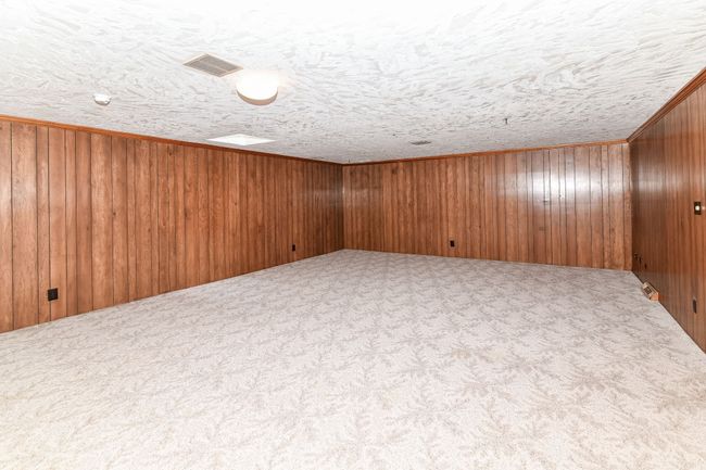 Lower Level Family Room. Paneled Walls | Image 16