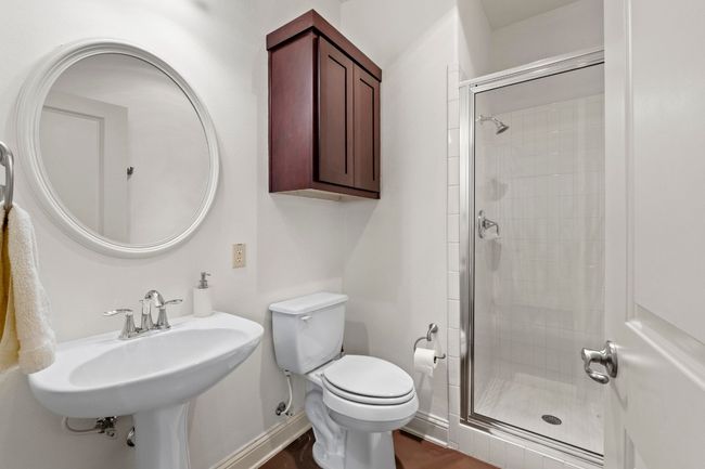 The downstairs bathroom is equipped with a shower - so unique to these Mueller homes. A full bath on the first floor! | Image 32