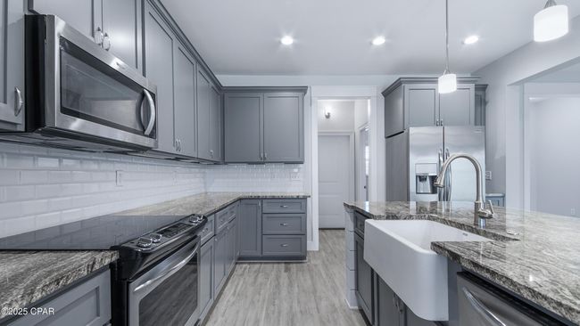 1208 W 12 Th St, House other with 4 bedrooms, 2 bathrooms and null parking in Lynn Haven FL | Image 11