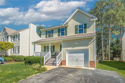 Front of home view from paved, 2-car driveway | Image 2