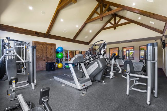 Workout area with high vaulted ceiling and beamed ceiling | Image 15