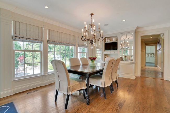 Breakfast room w. custom cabinetry and TV | Image 12