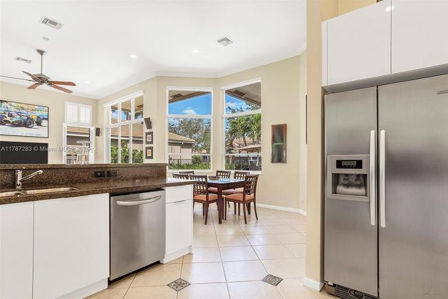 3848 Oak Ridge Cir, House other with 4 bedrooms, 3 bathrooms and null parking in Weston FL | Image 33