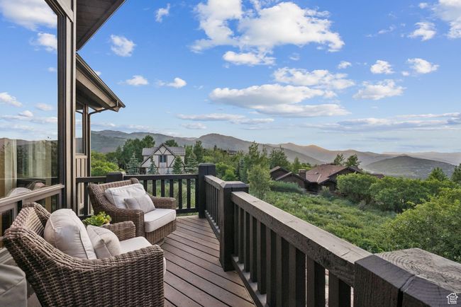 Balcony featuring a mountain view | Image 28