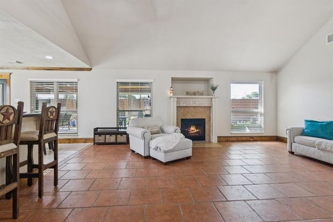 Tile floors and lots of windows allow for ample natural light. | Image 19