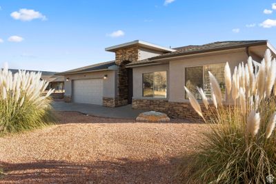 View of front of property with a garage | Image 1