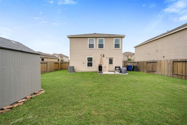 Big backyard with extended patio slab | Image 24