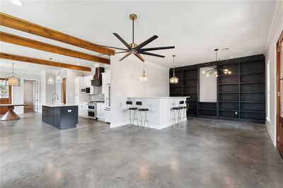 Entry view of bar area and kitchen | Image 3