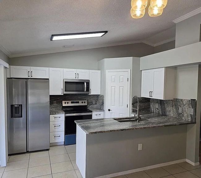 1817 Sw Leafy Rd, House other with 3 bedrooms, 2 bathrooms and null parking in Port St. Lucie FL | Image 6