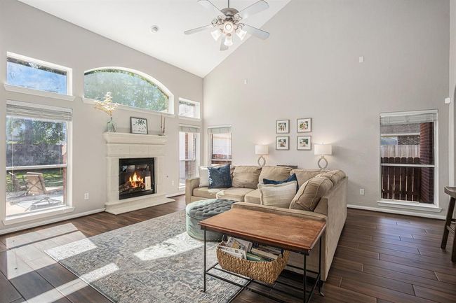 Family room with fireplace | Image 13