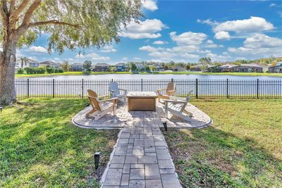 Relaxing water views under the canopy of a majestic tree! | Image 2