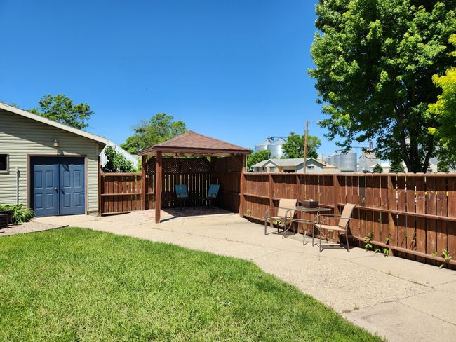As you exit the back door, you are greeted with this amazing patio area. | Image 18