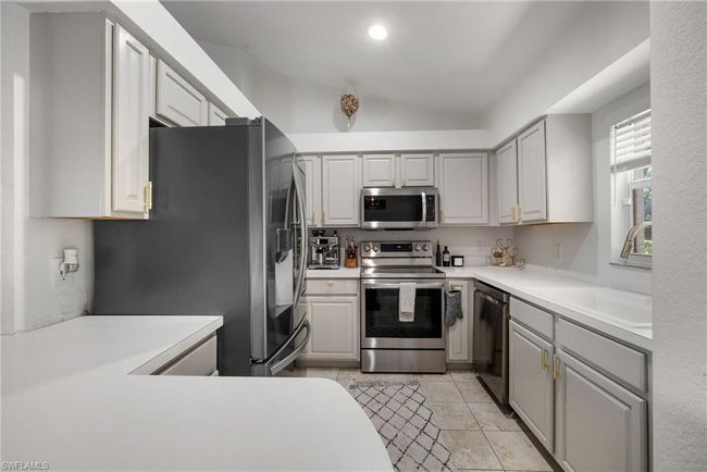 23485 Olde Meadowbrook Cir, House other with 3 bedrooms, 2 bathrooms and 2 parking in ESTERO FL | Image 16