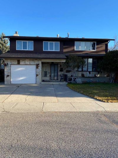 106 Laval Rd W, House other with 7 bedrooms, 5 bathrooms and 6 parking in Lethbridge AB | Image 1