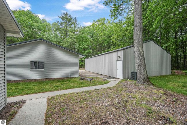 6836 Aarwood Trl Nw, House other with 4 bedrooms, 2 bathrooms and null parking in Rapid City MI | Image 54