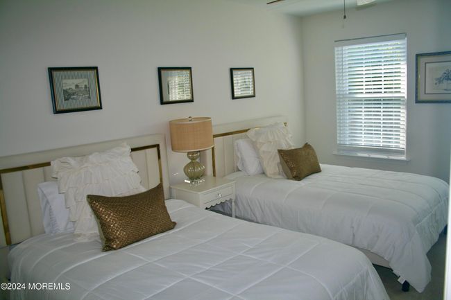Guest bedroom with 2 full beds | Image 12