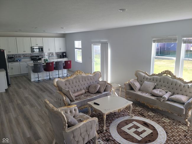 living room featuring light wood-style flooring and recessed lighting | Image 5