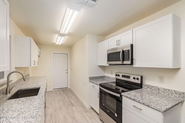 158 Billiar Ave Ne, House other with 3 bedrooms, 2 bathrooms and null parking in Palm Bay FL | Image 11