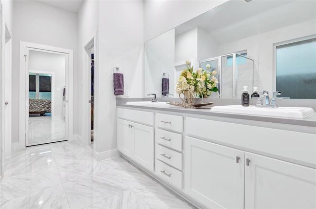 Modern, double sinks, and spacious primary bath. | Image 33