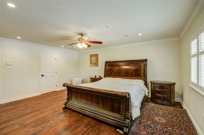 Ahead center is access to one of two large walk-in closets. | Image 20