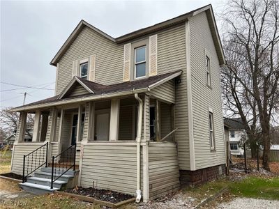 View of front of home with covered porch | Image 2