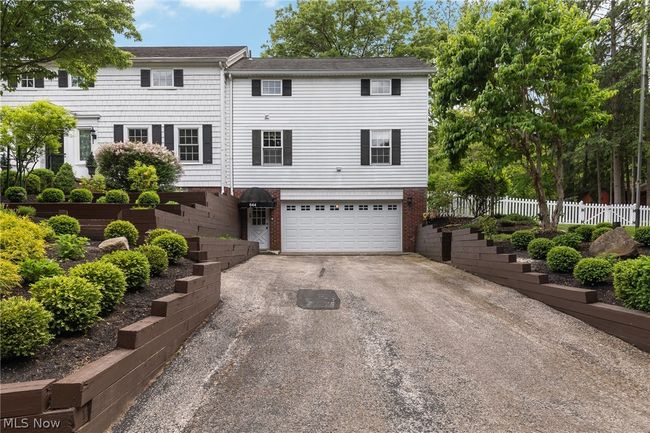 View of front of property featuring a garage | Image 6